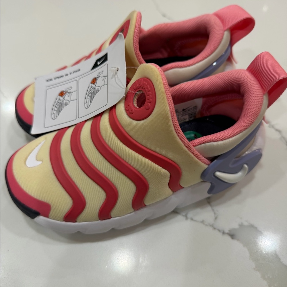 Nike Kids Sneakers in Pink, Yellow, and Purple